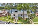 Lovely townhome near a lake, featuring a lush lawn and convenient parking at 129 Golden Eye Dr # C, Daytona Beach, FL 32119