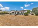 Quaint one-story home with neat landscaping and black shutters at 8720 Sw 108Th Ln, Ocala, FL 34481