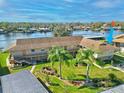 Beautiful view of the condo with well maintained lawn and landscaping at 1640 Juno Trl # 105D, Astor, FL 32102
