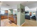 Well-designed kitchen with granite countertops, stainless steel appliances, and a seamless flow to the living area at 2071 S Atlantic Ave # 1005, Daytona Beach Shores, FL 32118