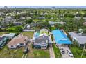 Aerial view showcasing neighborhood homes with well-maintained lawns, swimming pool, and ample parking at 342 Euclid Ave, Daytona Beach, FL 32118