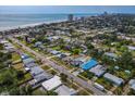 Overhead shot showcasing city neighborhood with a beach nearby and buildings along the shore at 342 Euclid Ave, Daytona Beach, FL 32118