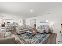 Bright and airy living room with elegant furnishings and open floor plan leading to the kitchen at 3828 S Atlantic Ave, Daytona Beach, FL 32118