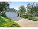 Charming one-story home with a spacious driveway and well-maintained front yard at 1317 Northside Dr, Ormond Beach, FL 32174
