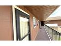 Exterior hallway and walkways to the units, creating a welcoming, private entrance at 1640 Juno Trl # 202E, Astor, FL 32102