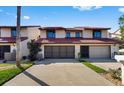 Charming exterior showcasing a well-maintained facade, complemented by a spacious driveway at 2934 Oceans Trce, Daytona Beach Shores, FL 32118