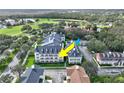 Picture of the exterior of a multi-Gathering home with balconies and manicured lawn at 280 Celebration Blvd # 203, Kissimmee, FL 34747