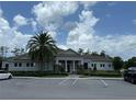 Community clubhouse with ample parking and accessible entrances at 551 Shaelyn Pl, Deland, FL 32724