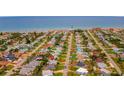 Breathtaking aerial view of a quaint coastal community near the ocean at 33 Camellia Dr, Ormond Beach, FL 32176