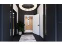 Elegant entryway featuring a statement chandelier and modern finishes at 2360 Ocean Shore Blvd # 26, Ormond Beach, FL 32176