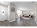 Bright and airy living room featuring stylish decor, modern flooring, and ample natural light at 105 Bonita Pl, Ormond Beach, FL 32174
