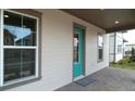 Charming home exterior with a covered porch, neutral siding, and well-placed windows for natural light at 10218 Dulbecco St, Orlando, FL 32827