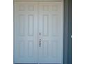 Close up image of a double front door at 2311 Juniper Berry Dr, Minneola, FL 34715