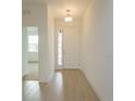 Bright entryway with tile floors and neutral-colored walls at 5807 Wallis Ln, Saint Cloud, FL 34771