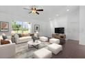 Bright living room boasts vaulted ceilings, comfortable seating, and large windows at 14853 Sw 26Th Ln, Ocala, FL 34481