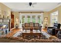 Living room with fireplace and hardwood floors at 15634 Vista Verde Dr, Montverde, FL 34756