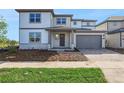 Charming two-story home featuring modern architecture and a welcoming entryway at 6616 Quest St, St Cloud, FL 34771