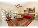 Spacious living area with sliding glass doors leading to a patio at 3109 Timucua Cir, Orlando, FL 32837