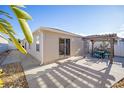 Private backyard with pergola, patio, and landscaping at 547 Richburg St, The Villages, FL 32162