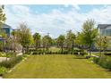 Scenic community green space with trees and landscaping at 9937 Gobat Aly, Orlando, FL 32827