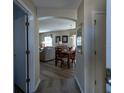 Bright entryway with view of dining area and living room at 2030 Alfredo Ave, The Villages, FL 32159