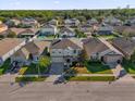 Street view showing a collection of homes in a well maintained community at 1961 Nations Way, Saint Cloud, FL 34769