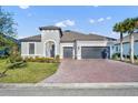 Charming single-Gathering home with brick driveway and manicured landscaping at 955 Ladera Ranch Rd, Kissimmee, FL 34759