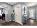 Front entry hall with storage and neutral wall color at 1270 Stratton Ave, Groveland, FL 34736