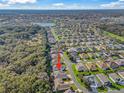 Aerial view showing home's location in a quiet residential neighborhood at 10994 Se 168Th Loop, Summerfield, FL 34491