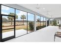 Spacious screened-in porch overlooking the golf course at 3606 Adamsville Ave, The Villages, FL 32163