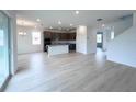 Spacious open-concept kitchen with ample counter space and lots of natural light at 2833 Supermarine Rd, Tavares, FL 32778