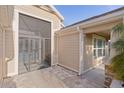 Home features a screened-in porch with a charming entrance at 3113 Sweetgum St, The Villages, FL 32163