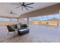 Covered patio with seating and a view of the pool at 3113 Sweetgum St, The Villages, FL 32163