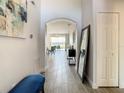 Bright and airy entryway with tile floors and a view of the living area at 223 Knollwood Dr, Davenport, FL 33837