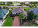 Property's aerial view showing house and landscape at 38626 Lakeview Walk, Lady Lake, FL 32159