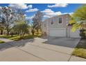 Two-story house with a three-car garage and large yard at 632 Monte Vista Way, Winter Garden, FL 34787