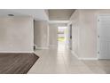 Bright hallway with tile floors and access to backyard at 632 Monte Vista Way, Winter Garden, FL 34787