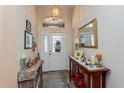 Bright and spacious entryway with console table at 5305 Indian Ocean Loop, Tavares, FL 32778