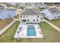 Home with pool and patio, in a residential area at 410 Cheeota Ct, Minneola, FL 34715
