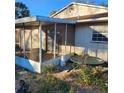 Spacious screened porch, perfect for relaxing outdoors at 2438 Centennial Blvd, Leesburg, FL 34748