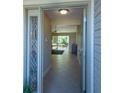 Open entryway with tile flooring and stained glass at 670 Murphys Estate Dr, The Villages, FL 32162