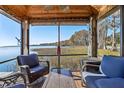 Relaxing screened gazebo on the dock with lake views at 9724 Rosemary Ln, Leesburg, FL 34788