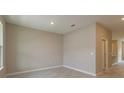 Neutral-toned dining area with tile floors and ample natural light at 13237 Peaceful Melody Dr, Winter Garden, FL 34787