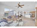 Spacious living room with open floor plan to kitchen at 12592 Se 97Th Terrace Rd, Summerfield, FL 34491