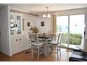 Bright dining area with table and chairs, adjacent to kitchen at 1401 W Highway 50 # 89, Clermont, FL 34711