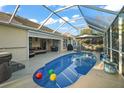 Relaxing pool area with covered patio and seating at 1712 Palo Alto Ave, Lady Lake, FL 32159