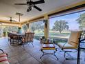 Relaxing screened porch overlooking a beautiful golf course at 581 Society Hill Cir, The Villages, FL 32162