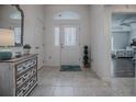 Bright entryway with tile flooring and decorative accents at 963 Hart Dr, The Villages, FL 32163