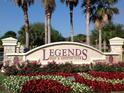 Legends Golf & Country Club entrance sign with landscaping at 4077 Greystone Dr, Clermont, FL 34711