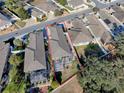 Aerial view showcasing home's layout and backyard at 8480 Se 167Th Forsyth St, The Villages, FL 32162